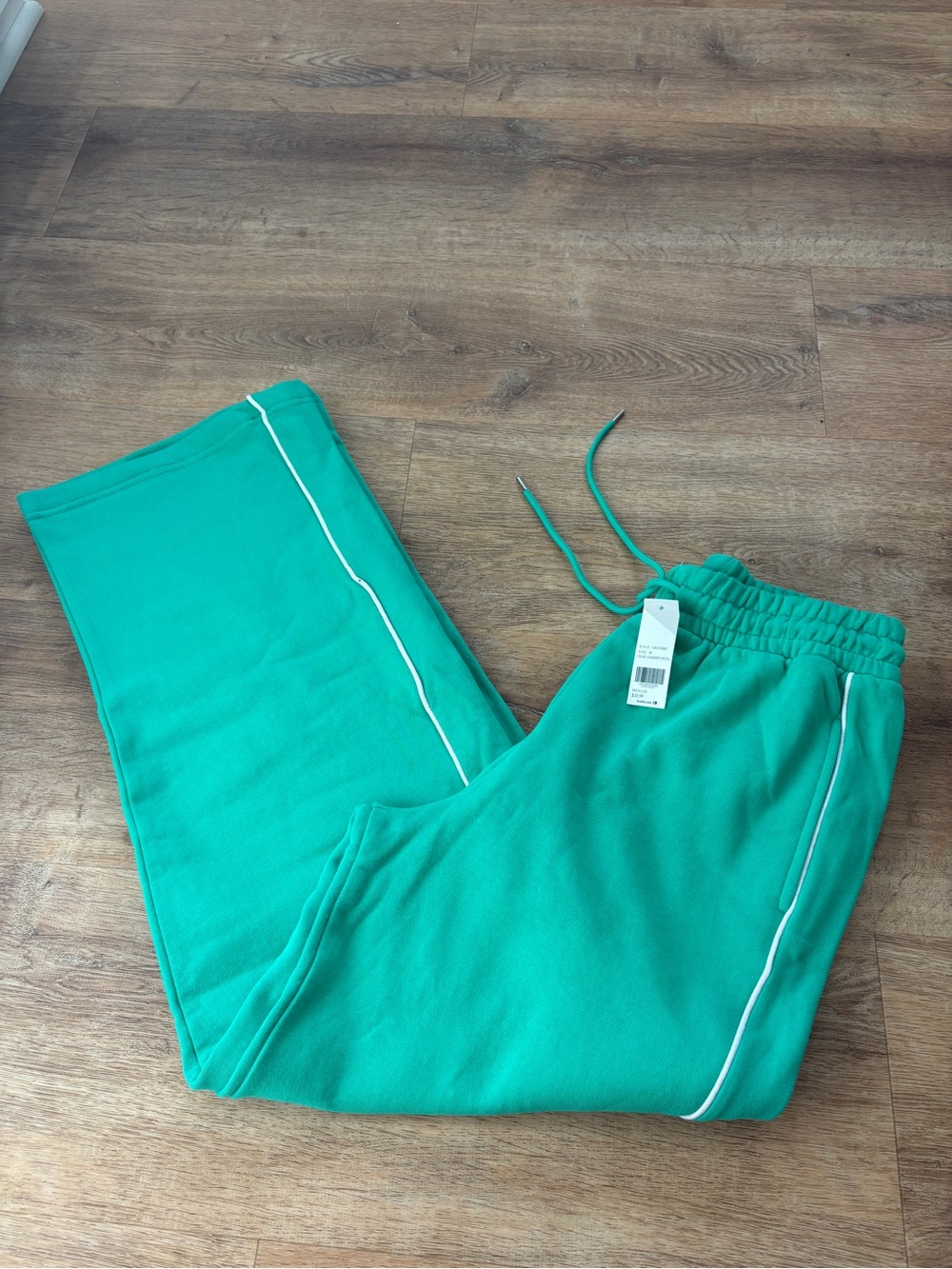 Green Boot‑Cut Sweatpants with White Piping